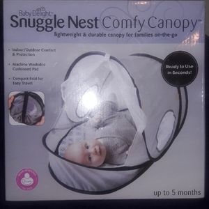 Snuggle nest comfy canopy for a baby